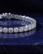 Wide tennis bracelet with a continuous line of large round lab-grown diamonds in gold