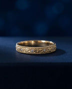 Gold ring with a pleated fluted band set with small cognac lab-grown diamonds