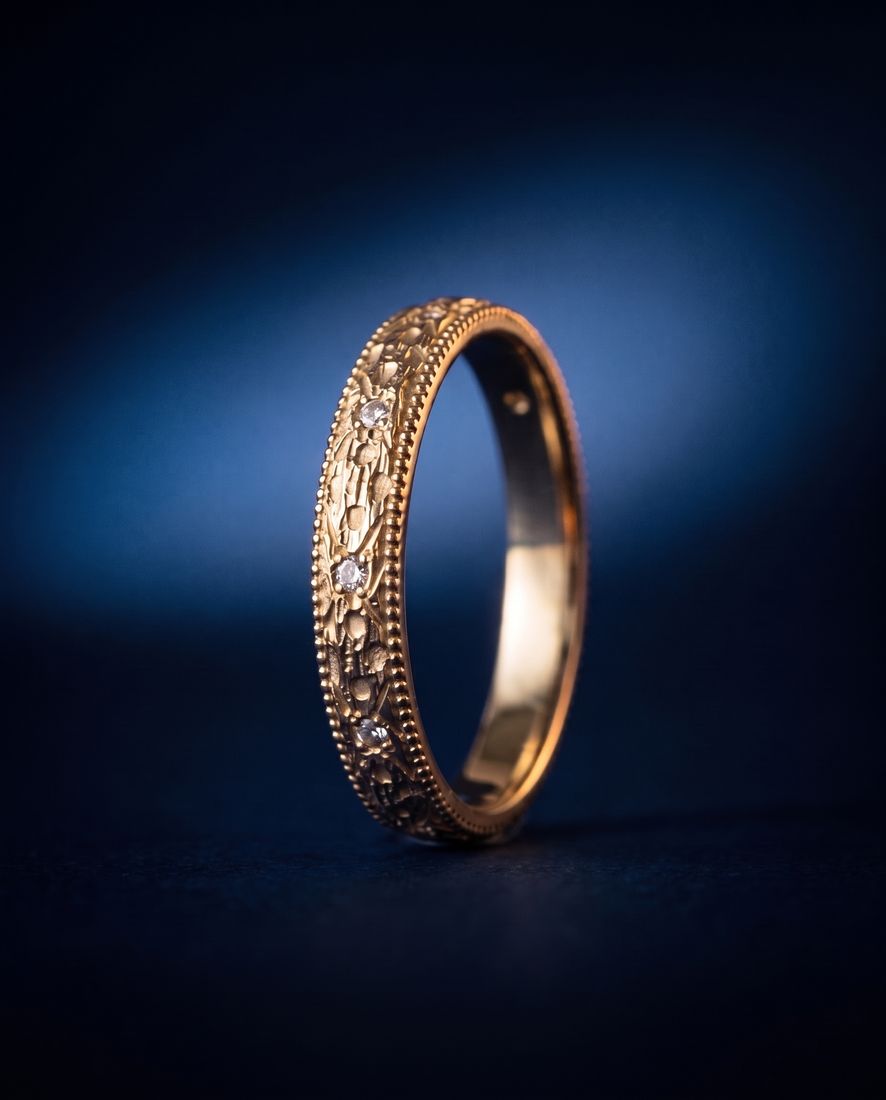Gold ring with a pleated fluted band set with small cognac lab-grown diamonds