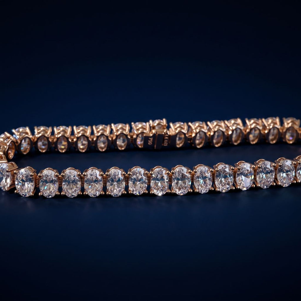 Tennis bracelet of oval-cut lab-grown diamonds set side by side in gold
