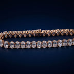 Tennis bracelet of oval-cut lab-grown diamonds set side by side in gold