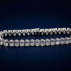 Tennis bracelet of oval-cut lab-grown diamonds set side by side in gold