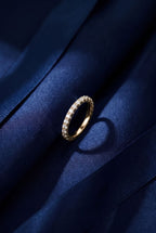 Fine gold pavé band set all around with small round lab-grown diamonds