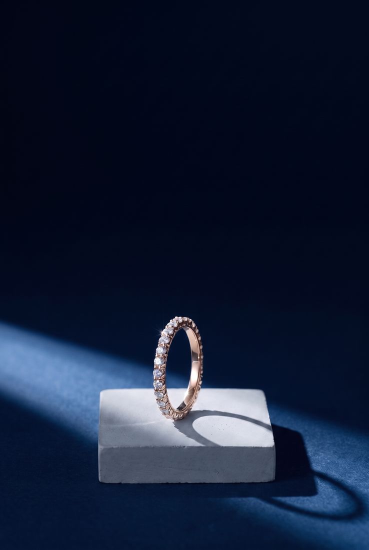 Fine gold pavé band set all around with small round lab-grown diamonds