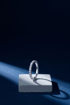 Fine gold pavé band set all around with small round lab-grown diamonds
