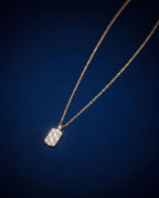 Fine gold chain with a small rectangular pendant set with cognac lab-grown diamonds
