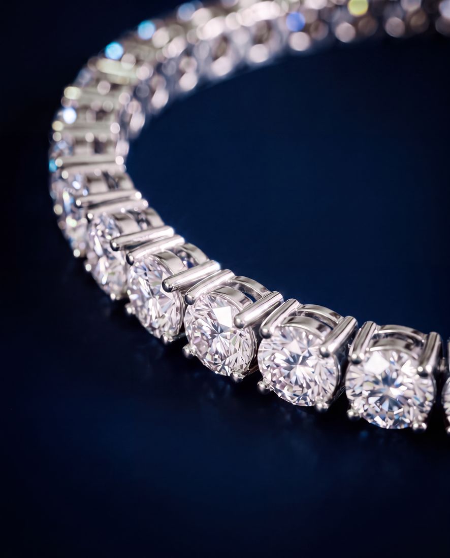 Wide tennis bracelet with a continuous line of large round lab-grown diamonds in gold