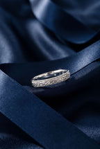 Gold ring with a pleated fluted band set with small cognac lab-grown diamonds