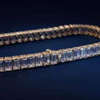 Tennis bracelet of rectangular baguette-cut lab-grown diamonds set end to end in gold