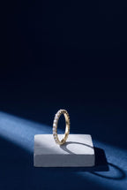 Fine gold pavé band set all around with small round lab-grown diamonds